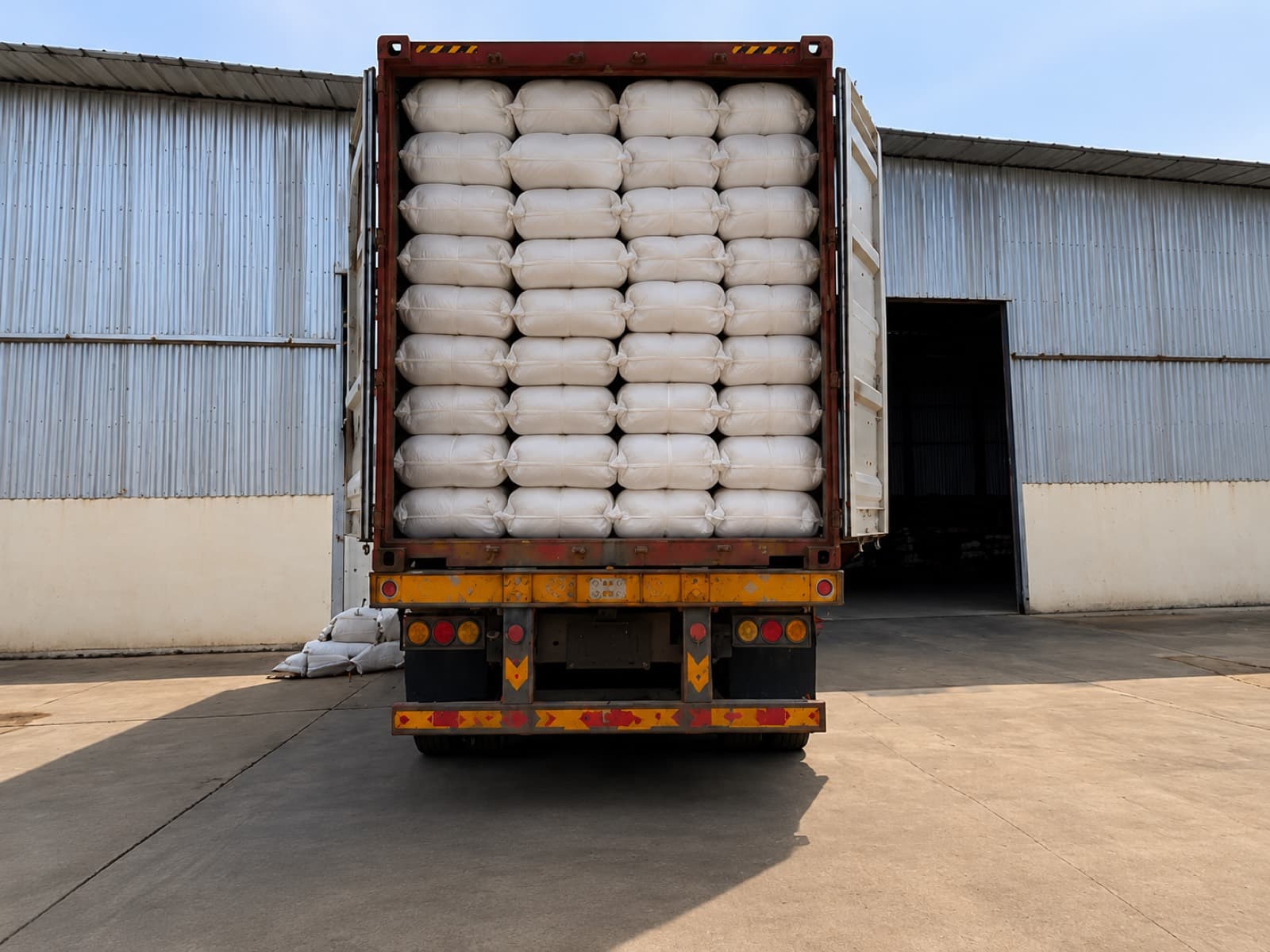 Shipping container fully loaded with packed bedding products
